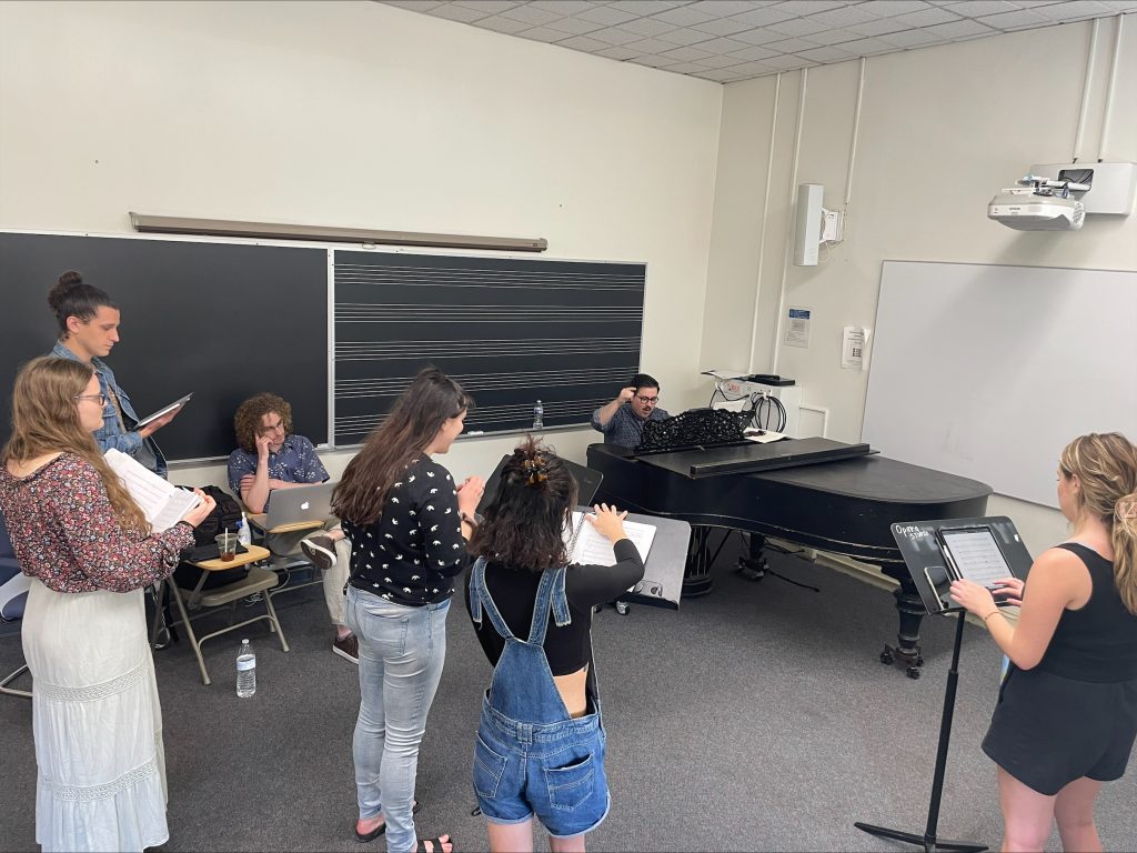 Vocalists and composers workshopping in Opera Etudes class