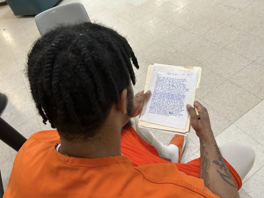 Program participant writing poetry